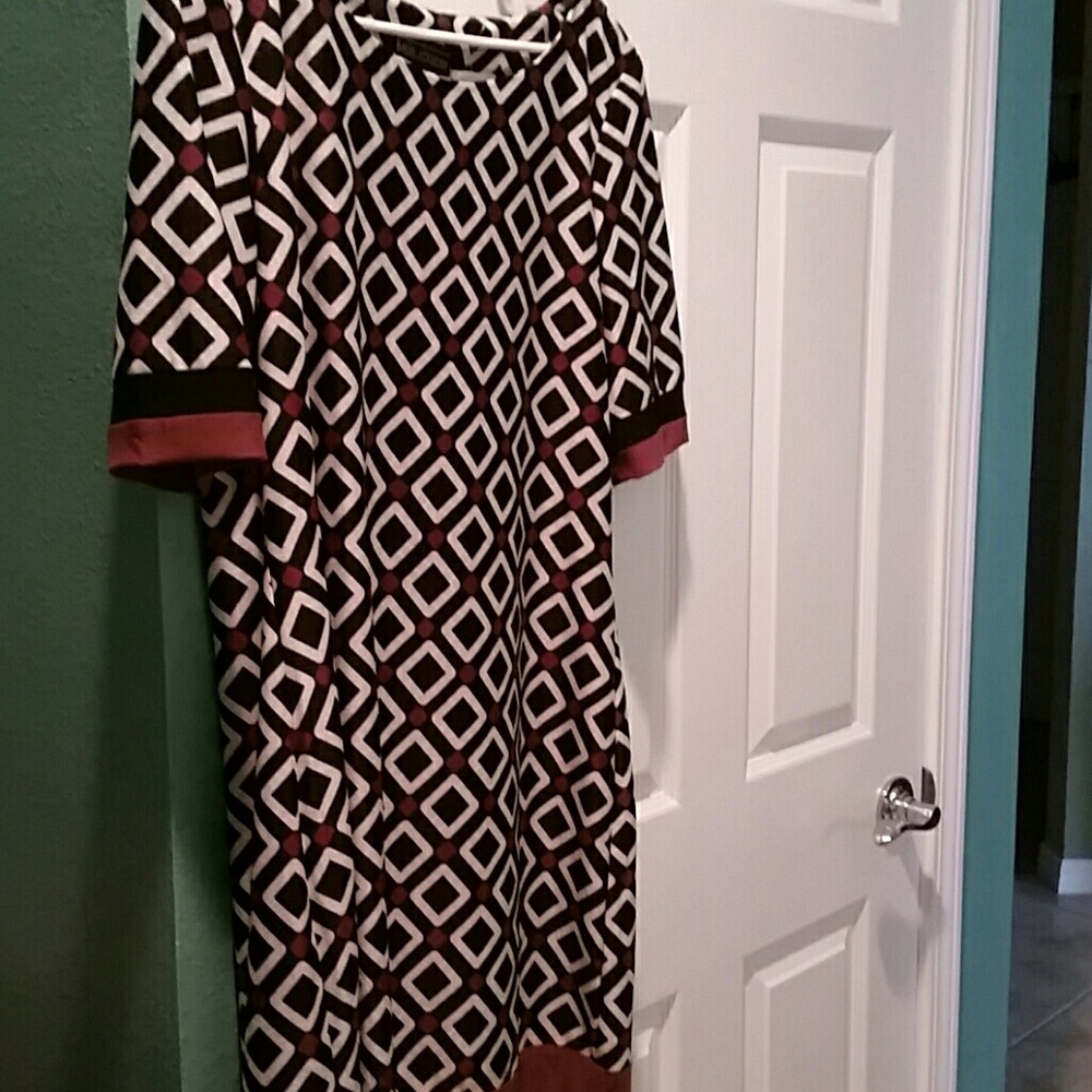 Pretty new dress in black brown and white. Size 16